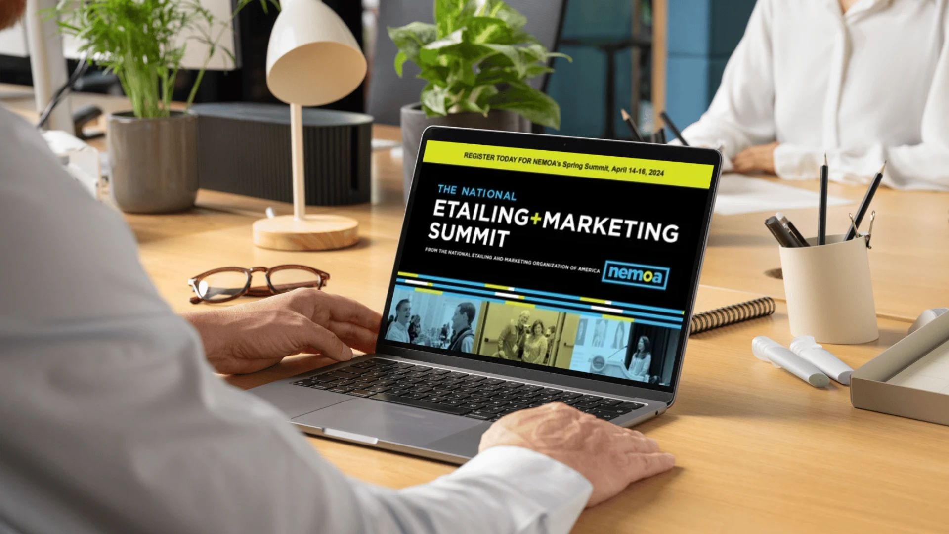 Nemoa Summit website on laptop