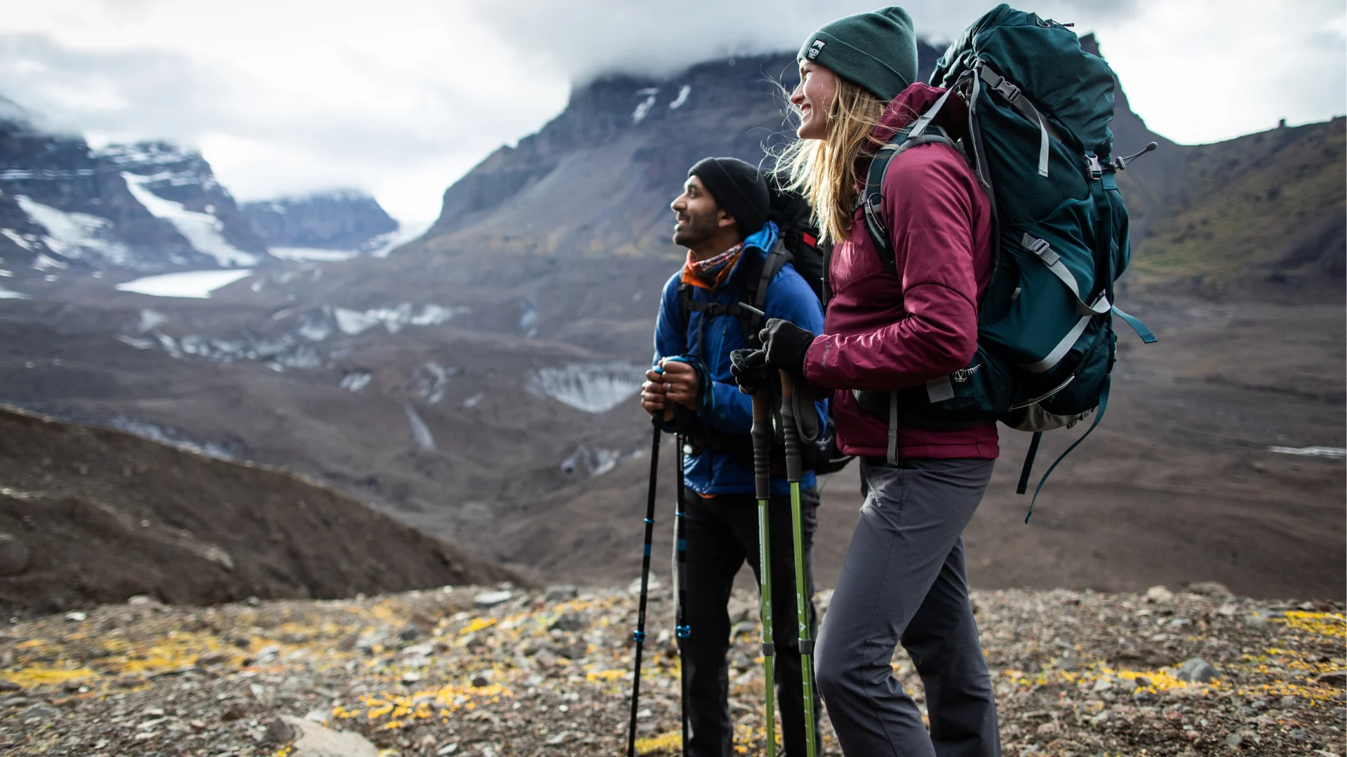 Hikers with Osprey packs on a glacier