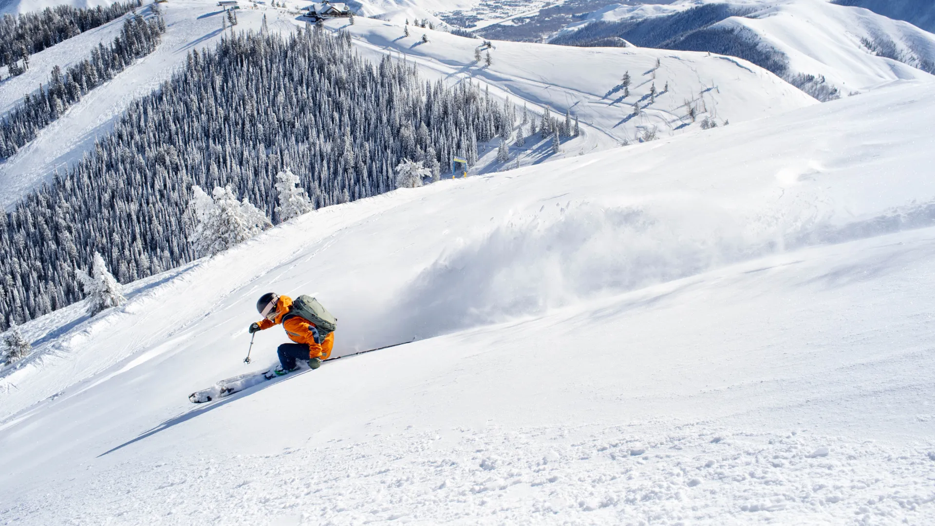 Backcountry skier with an Osprey pack