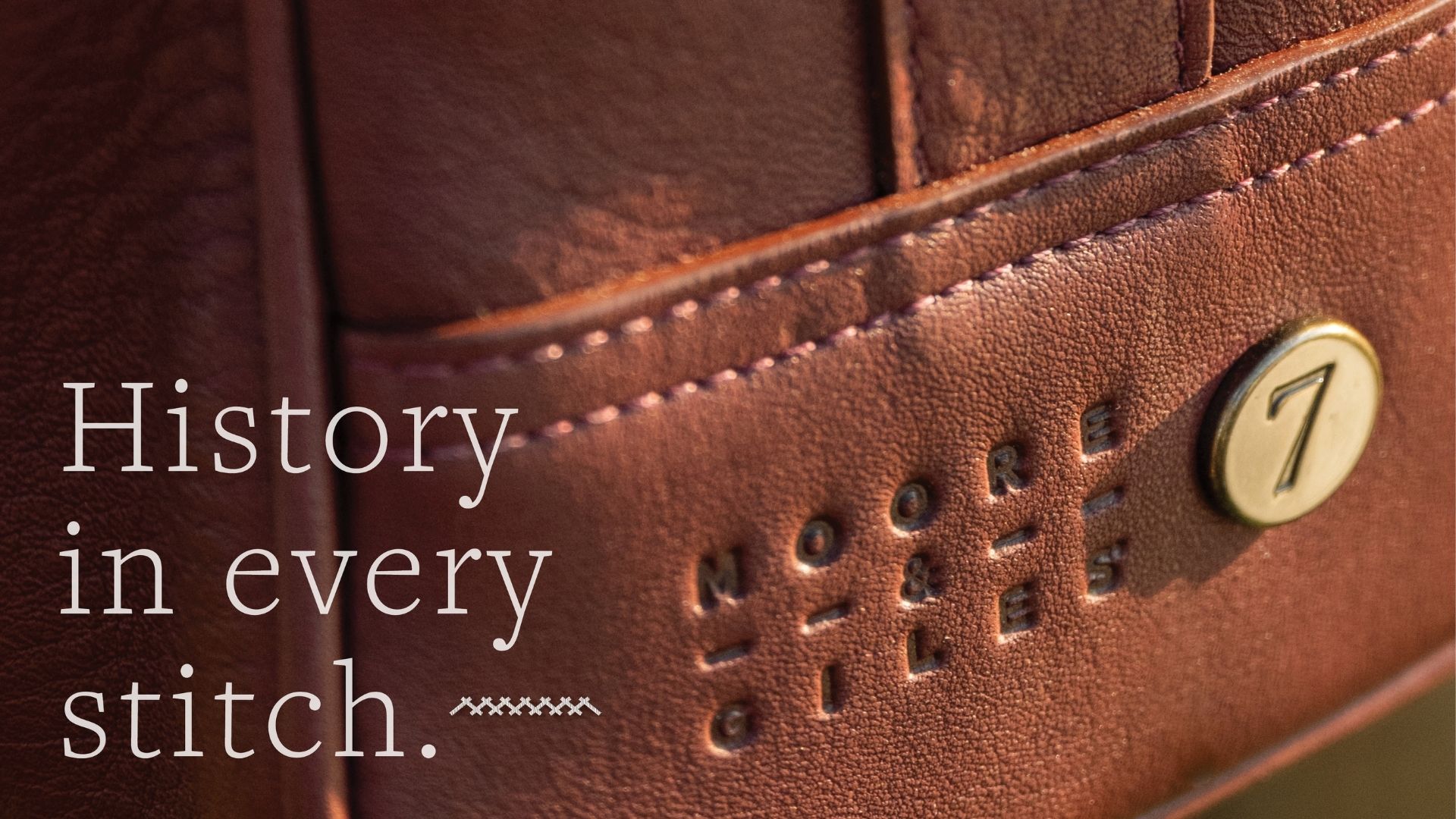 Seven Hills History in Every Stitch History in Every Stitch overlaid on high quality leather bag.
